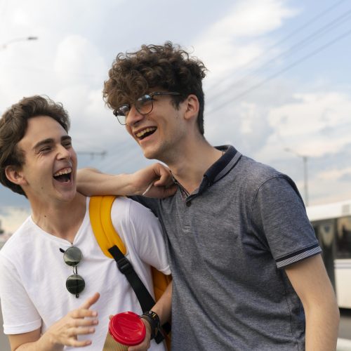 two-male-friends-spending-time-together-outdoors